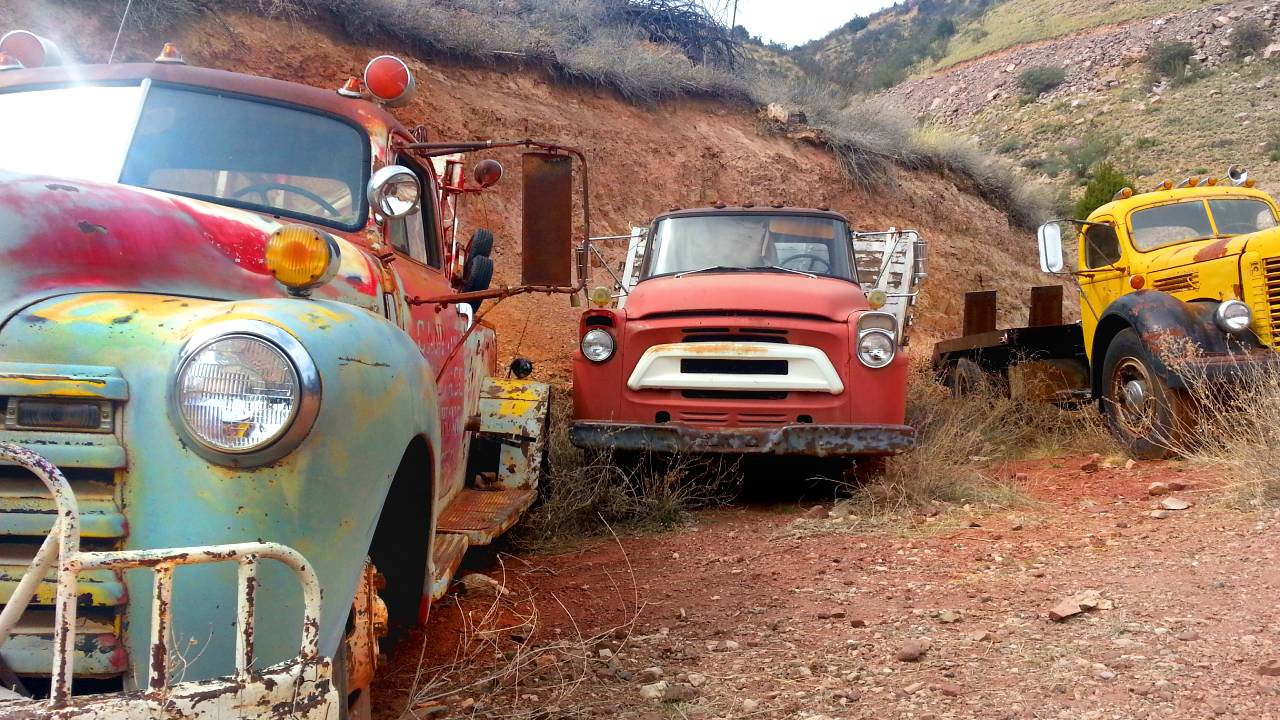 junk cars in a valley
