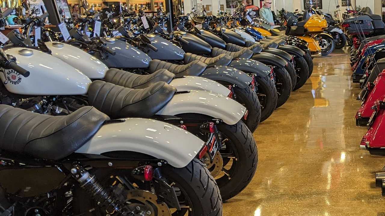 motorcycles lined up in a shop