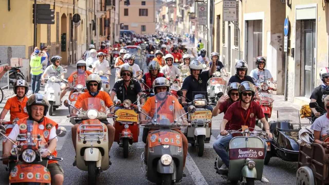 vespa riders in a group