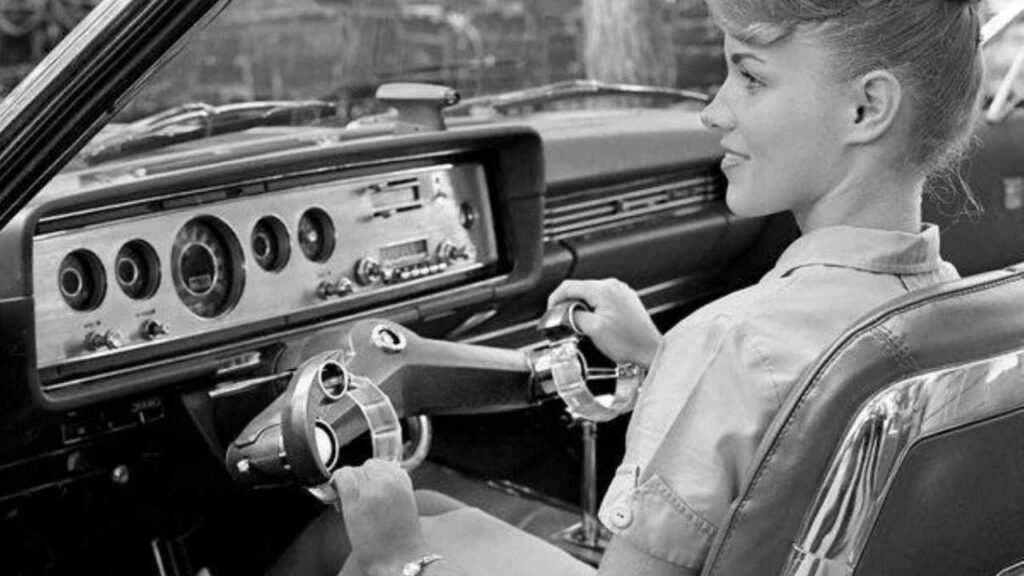 wrist twist steering wheel with woman driving
